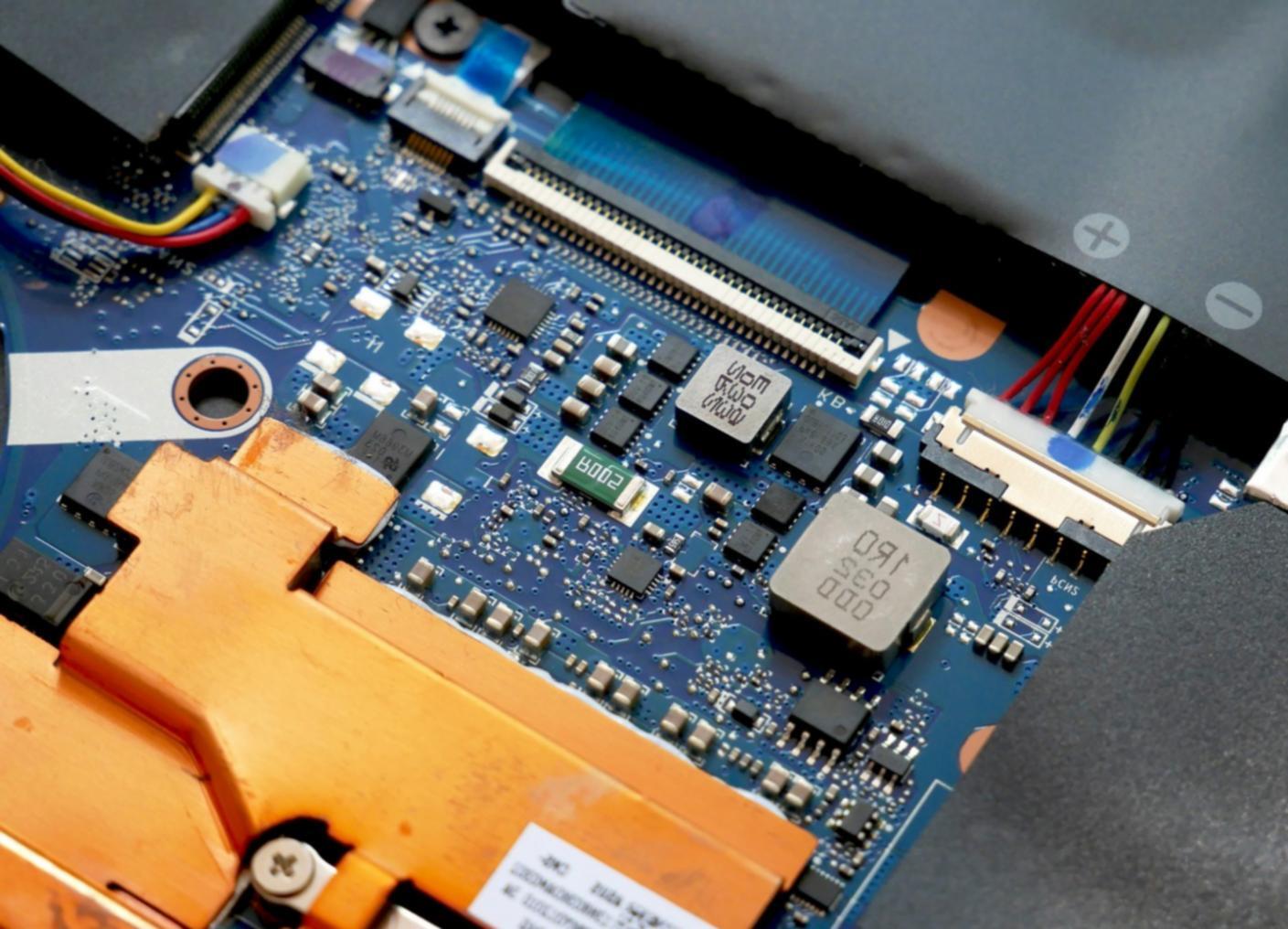 Developer reviewing blockchain code on multiple monitors in modern workspace