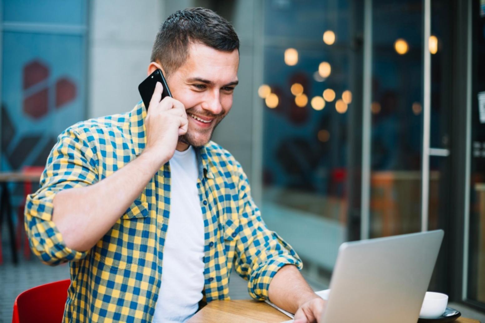 Student team reviewing decentralized application architecture on multiple monitors